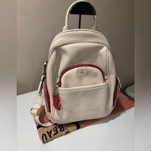 Juicy Couture White and Pink Faux Leather Backpack with bag charms, Preowned
